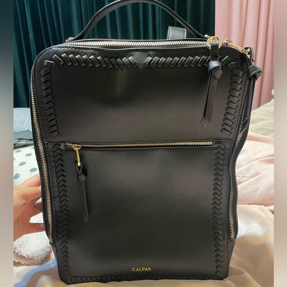 Used black Calpak Kaya 15in Laptop Backpack